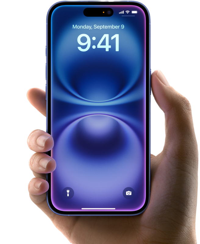 Hand holding iPhone 16